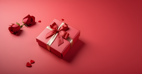 红色玫瑰与红色礼品盒摄影图片